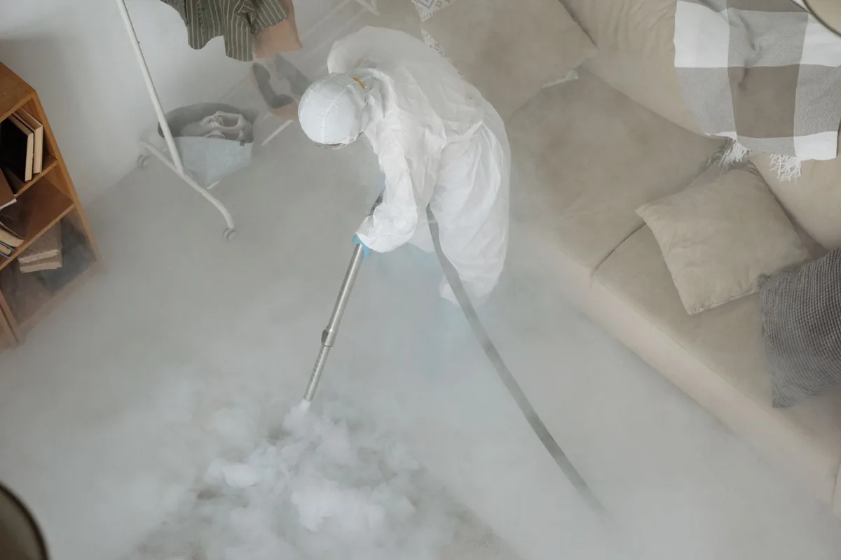 Biohazard cleanup technician in protective equipment, East Freehold, NJ